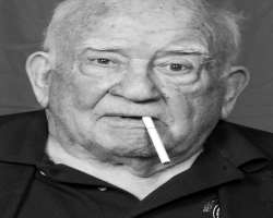 Ed Asner smoking